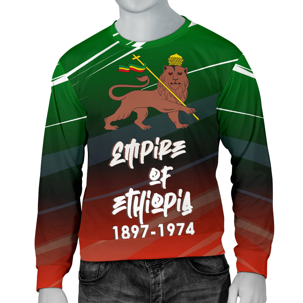A man's long-sleeved sweater with a colorful design featuring a lion, a crown, and the text 'EMPEROR OF ETHIOPIA 1897-1974'. The sweater has a striped pattern with red, green, and black colors.