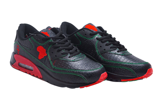 MLK-sneakers Black-Owned main pair of MLK sneakers with a red, black, and green color scheme, featuring a snakeskin print and green stitching.