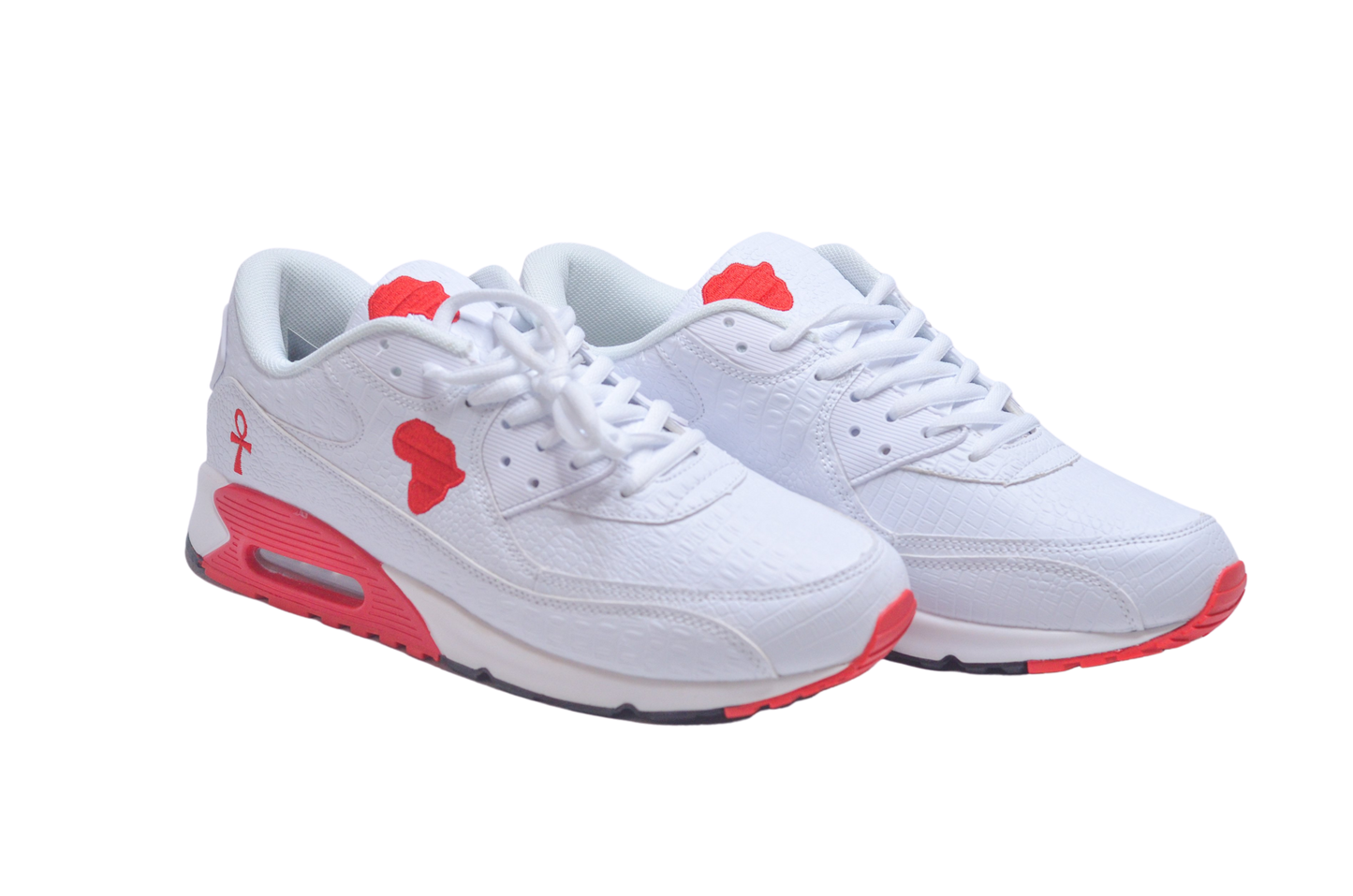 A pair of white sneakers with red and black accents, featuring a distinctive star design and the brand's logo on the sole.