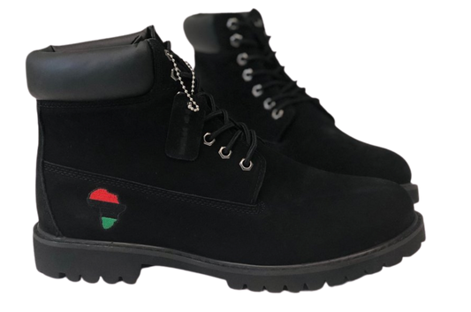 Nat Turner Boots side view showcasing black suede finish and Pan-African color detail.