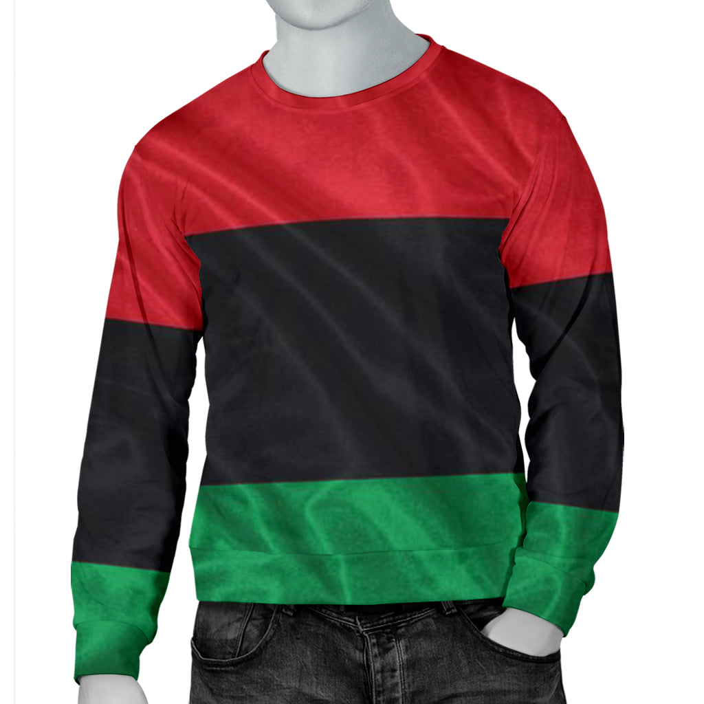 African RBG Flag Sweater worn by mannequin with one hand in pant pocket, representing casual heritage style.