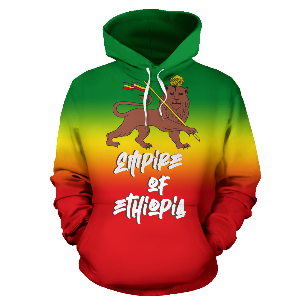 A hoodie with an illustration of a lion wearing a crown, surrounded by a rainbow-colored striped background, and text that reads 'EMPEROR OF ETHIOPIA'.