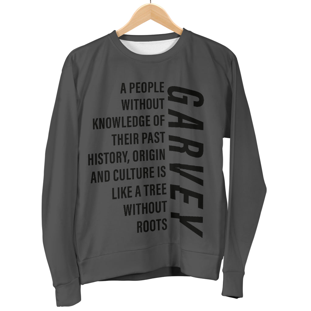 Garvey Quote Sweater hanging on display, showcasing custom Black-Owned design and woven polyester material.