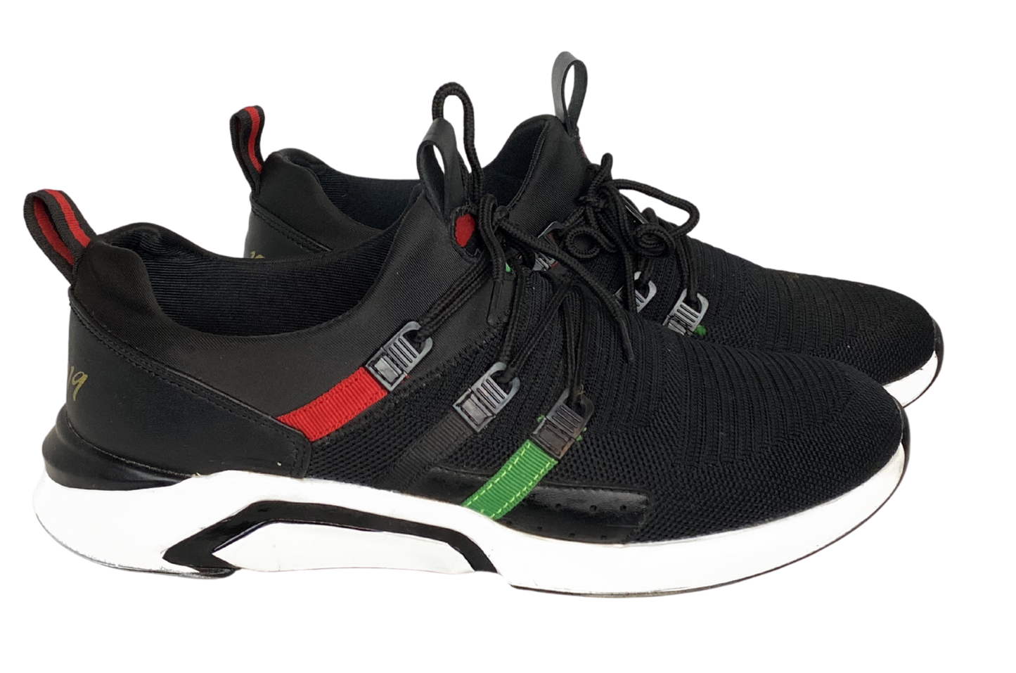 Side view of Genesis 15:13 Black-Owned Sneakers with red, black, and green accents on a sleek black base.