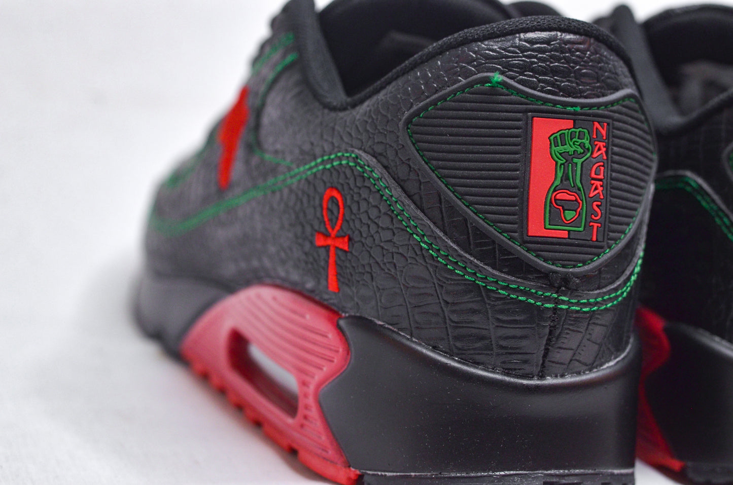 Back view of MLK Sneakers with red heel detailing, symbolizing heritage and pride.