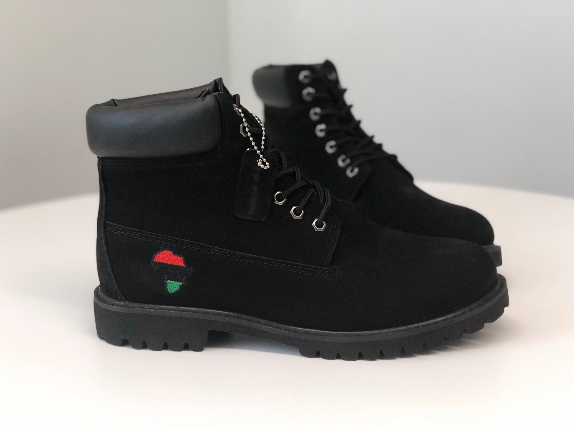 Angled view of Nat Turner Boots highlighting design, sturdy sole, and ankle support.