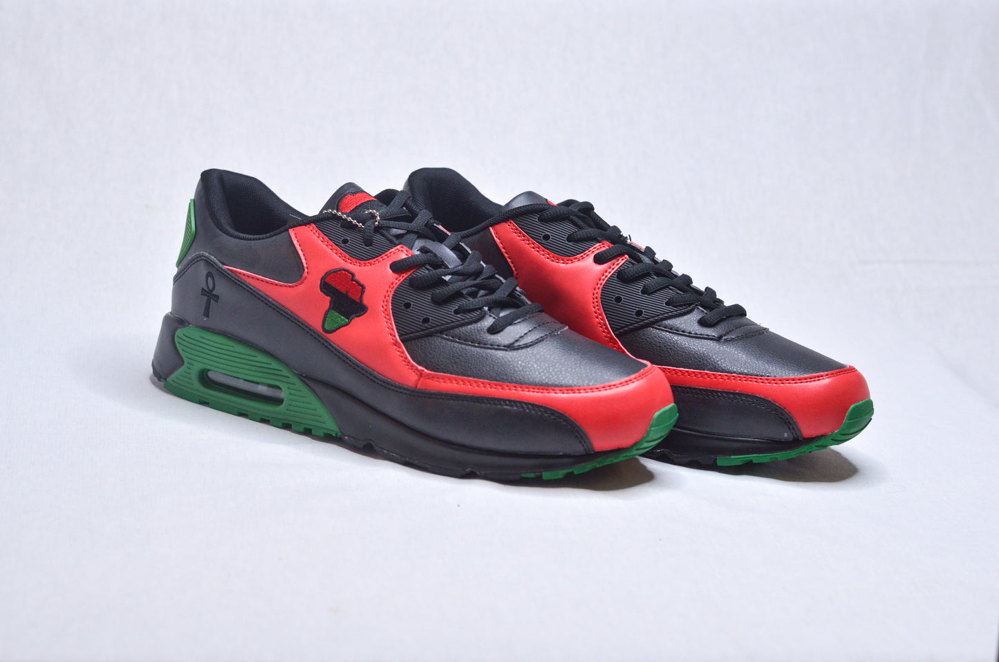 RBG African Running Sneakers side view – Black-owned footwear in red, black, and green design.
