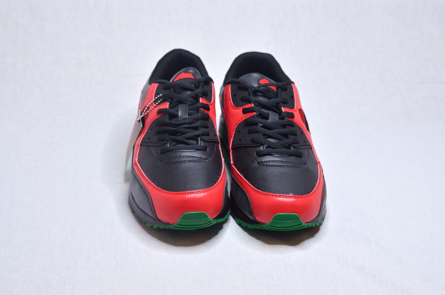 Top-down view of RBG African Running Sneakers – Cultural design in red, black, and green.