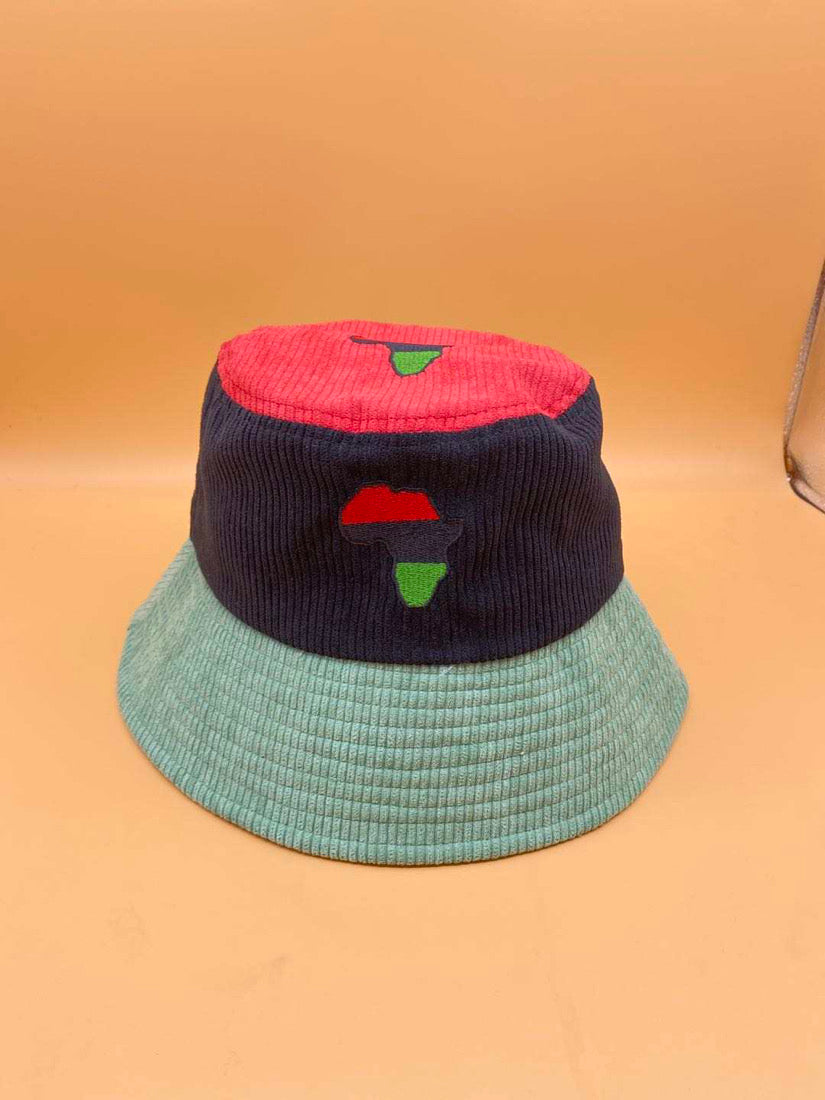RBG Bucket Hat laid flat, showing the African continent design in Pan-African red, black, and green colors, symbolizing unity and heritage from a Black-Owned brand.