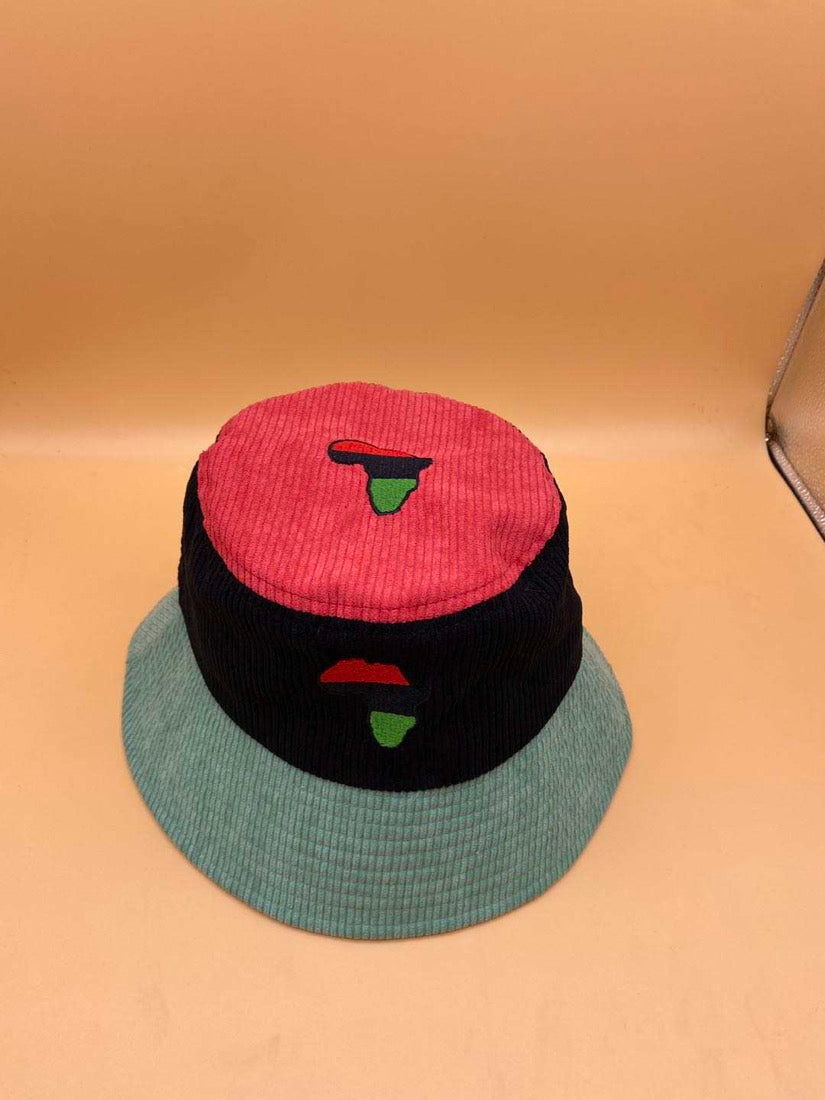 RBG Bucket Hat photographed from a slightly elevated angle, highlighting the African continent design and bold Pan-African color scheme from a Black-Owned brand.