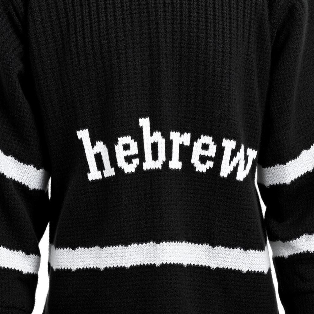 A black wool knitting hoodie with white Hebrew text on the front and white stripes on the sleeves.