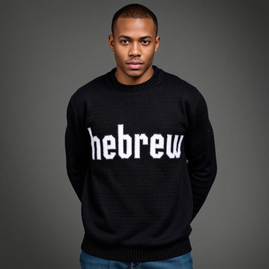 A man wearing a black Hebrew wool knitting hoodie with the text 'HEBREW' written in white on the front.