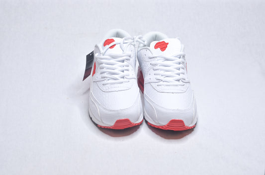 Top view of Marcus Garvey UNIA Star Sneakers, sleek white design with red sole and African continent logo.