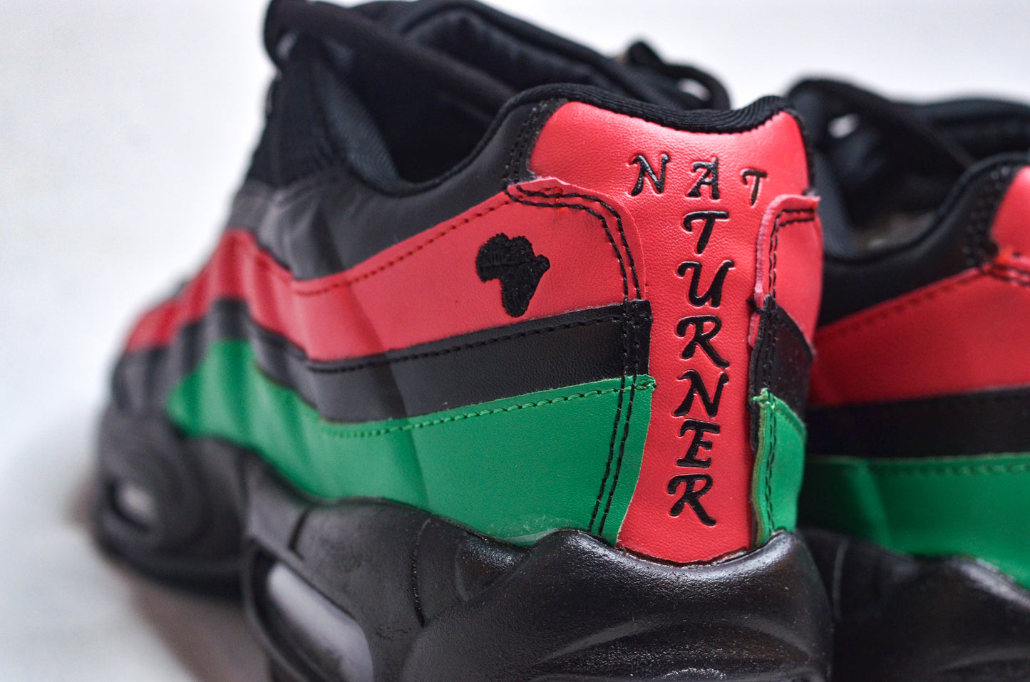 Back heel detail of NAT TURNER MAX Sneakers – Custom design honoring Nat Turner.